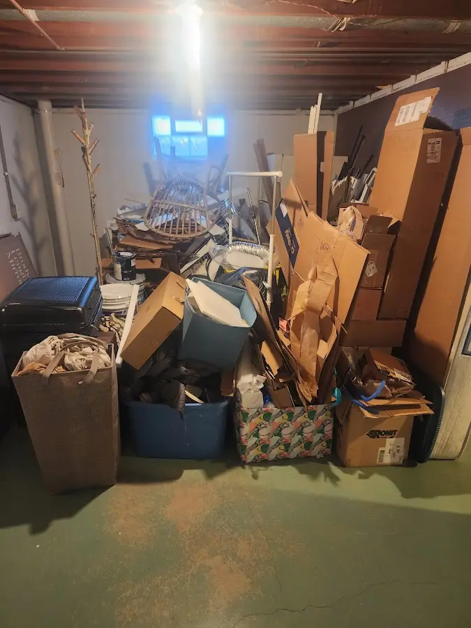 Roll-off dumpster container at job site for 2 Yard Dumpster Rental in Tropical Park